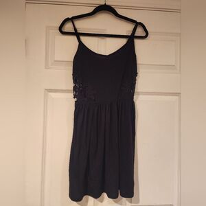 Stretchy black mini dress with midsection cutout M Juniors